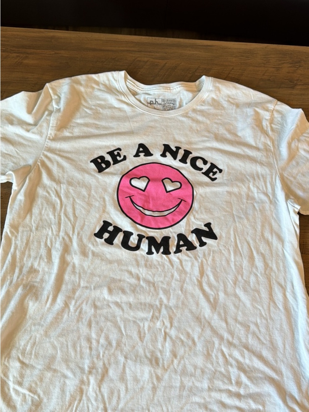 Be A Nice Human Pink Smiley Graphic Tee